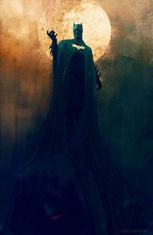 Batman standing in front of a large moon