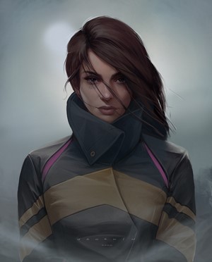 Woman with dark hair in a stylized jacket