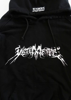 Black Vetements hoodie with white graphic logo