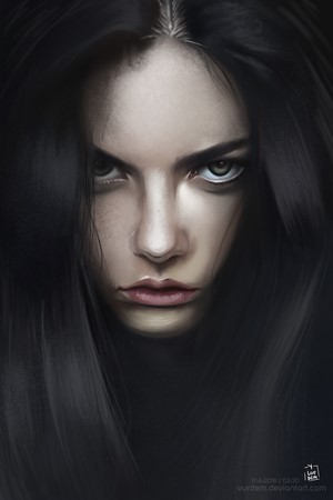 Portrait of a woman with long black hair and green eyes
