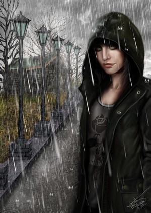 Woman in hooded jacket in the rain