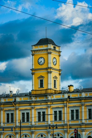 Yellow clock tower building in Saint Petersburg, Russia