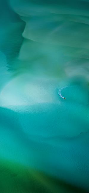 Aerial view of a boat on turquoise water