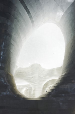Interior of a modern building with curved walls and bright light