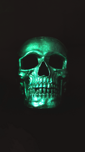 Green skull on a black background