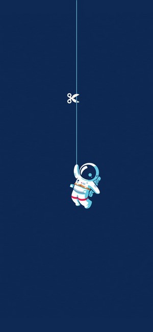 Astronaut hanging from a string being cut by scissors