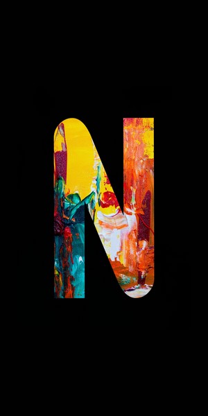 Abstract painting of the letter N on a black background