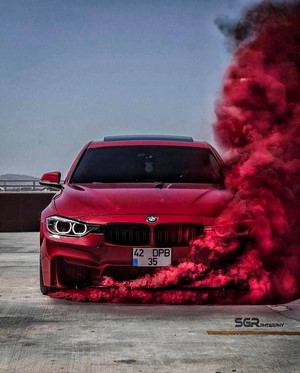 Red BMW Tuner Car with Striking Smoke Effect