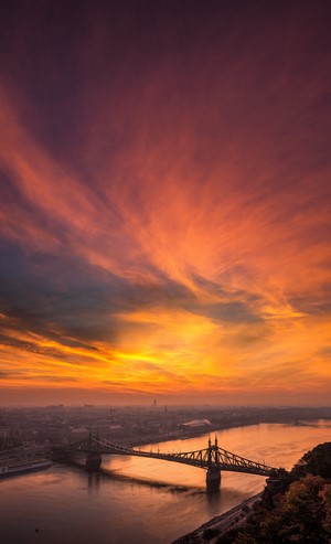 Liberty Bridge over Danube River at sunset in Budapest, Hungary