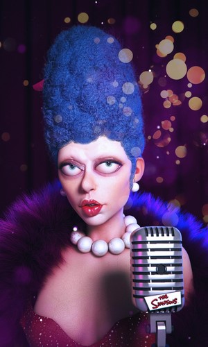 Marge Simpson from The Simpsons singing into a microphone