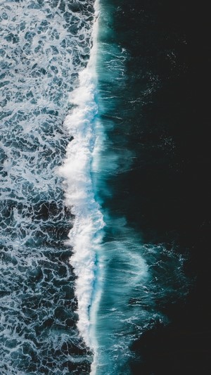 Aerial view of a breaking ocean wave