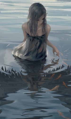 Fantasy girl with elf ears in water with fish