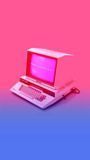 Vintage computer with pink screen on gradient background
