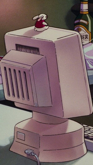 Anime monitor with a rabbit figurine
