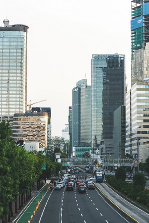 Jakarta Skyline with Traffic on a Highway