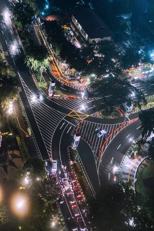 Aerial view of a busy intersection at night in Jakarta