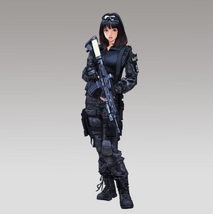 Woman in tactical gear holding a rifle