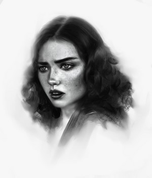 Monochrome portrait of a woman with freckles