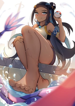 Nessa from Pokemon holding a Pokeball