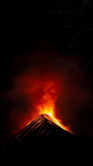Volcanic eruption at night