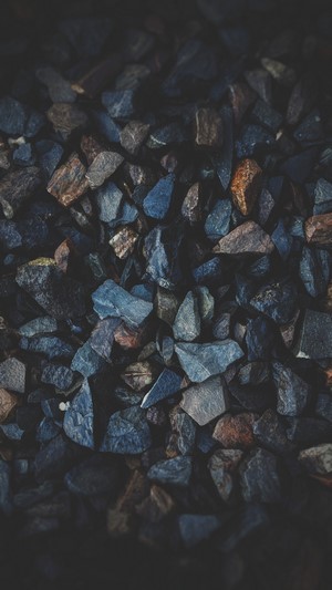 Close-up of dark gravel and stones