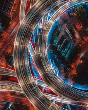 Aerial view of Shanghai highway at night with light trails
