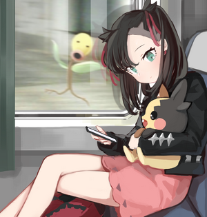 Marnie with Morpeko from Pokemon on a train
