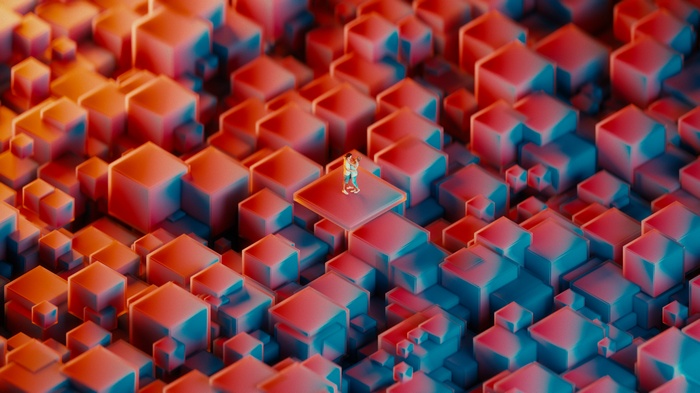 Couple embracing on a platform surrounded by cubes