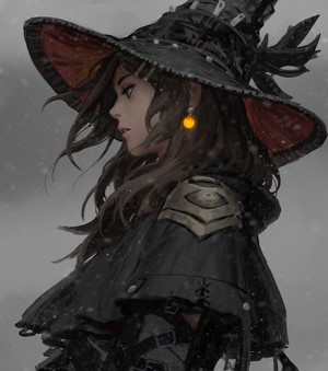Witch with glowing earring in snow