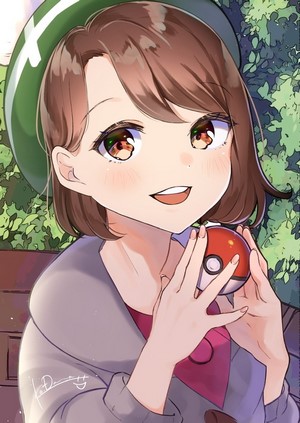 Gloria from Pokémon holding a Poké Ball