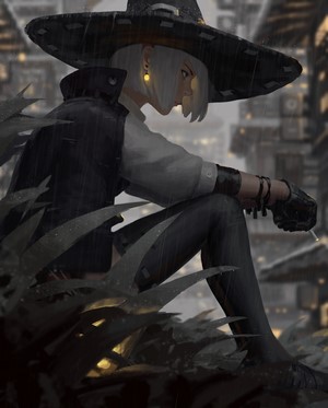 Woman in witch hat smoking in the rain