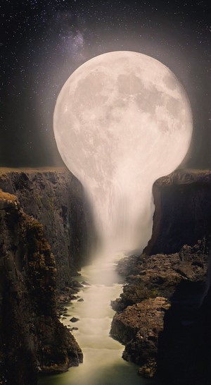 Moon waterfall over a canyon at night