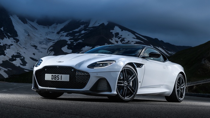 White Aston Martin DBS Superleggera on a mountain road