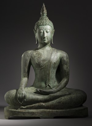 Bronze Buddha statue in meditation pose