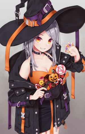 Anime girl in witch costume with Halloween candy