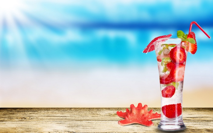 Strawberry Mojito on a Wooden Table at the Beach
