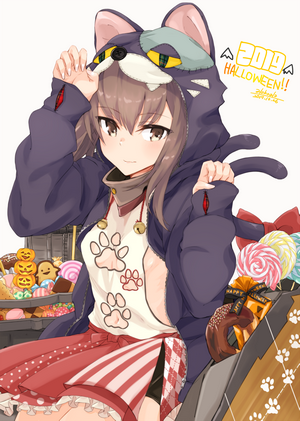 Anime girl in cat costume with Halloween candy
