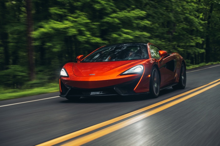 2018 McLaren 570S Spider driving on a road