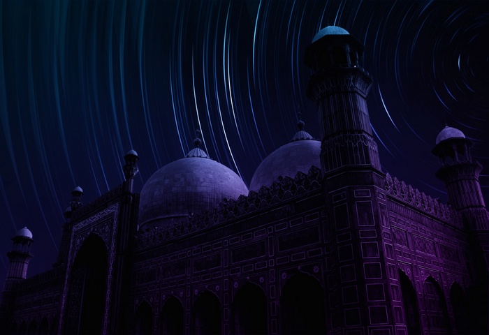 Badshahi Mosque at night with star trails