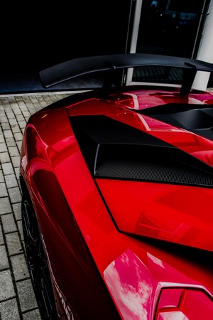 Red Lamborghini Aventador J rear view
