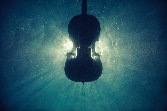 Underwater Cello Silhouette with Sun Rays