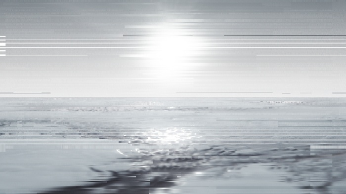 Glitch effect on a sunrise over the ocean