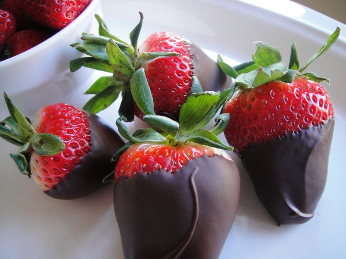 Chocolate Dipped Strawberries on a White Plate