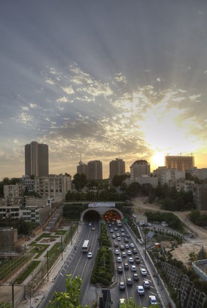Cityscape with traffic tunnel and sunset in Iran