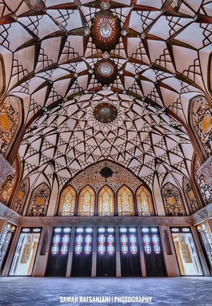 Interior of a historic building in Iran with ornate ceiling