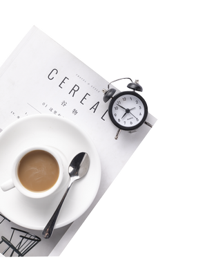 Alarm clock and coffee on Cereal magazine