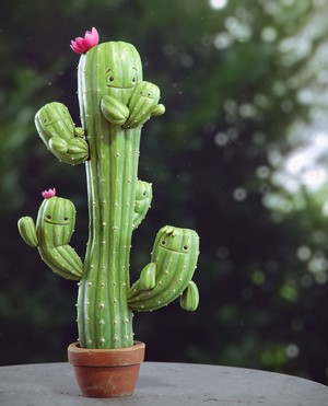 Family of smiling cacti in a pot