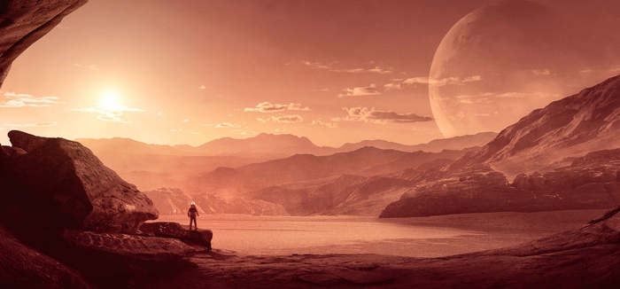 Astronaut on a rocky planet with a large moon