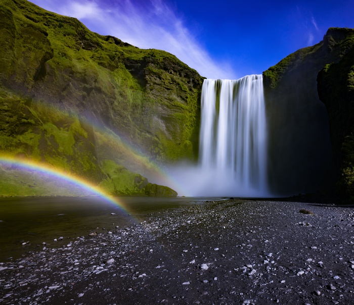 Skogafoss Waterfall and Rainbow in Iceland