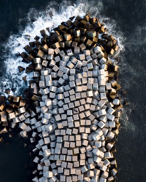Aerial view of concrete blocks on the coast of Barcelona